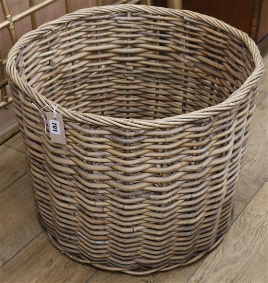 A circular log basket, W.60cm